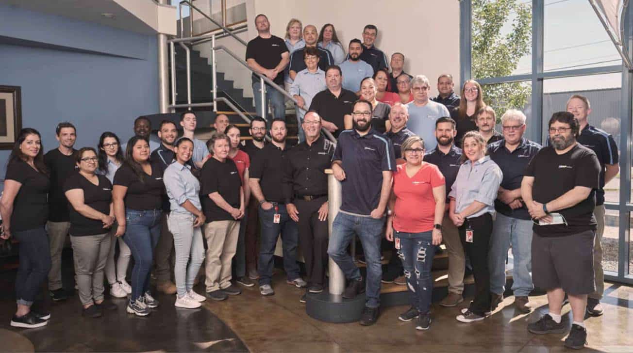 Group photo of BMP Medical team members gathered in the company’s office space.