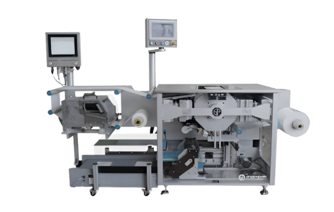 Automated form fill and seal machine with dual control monitors and roll-fed material system for packaging and labeling sterile medical products.